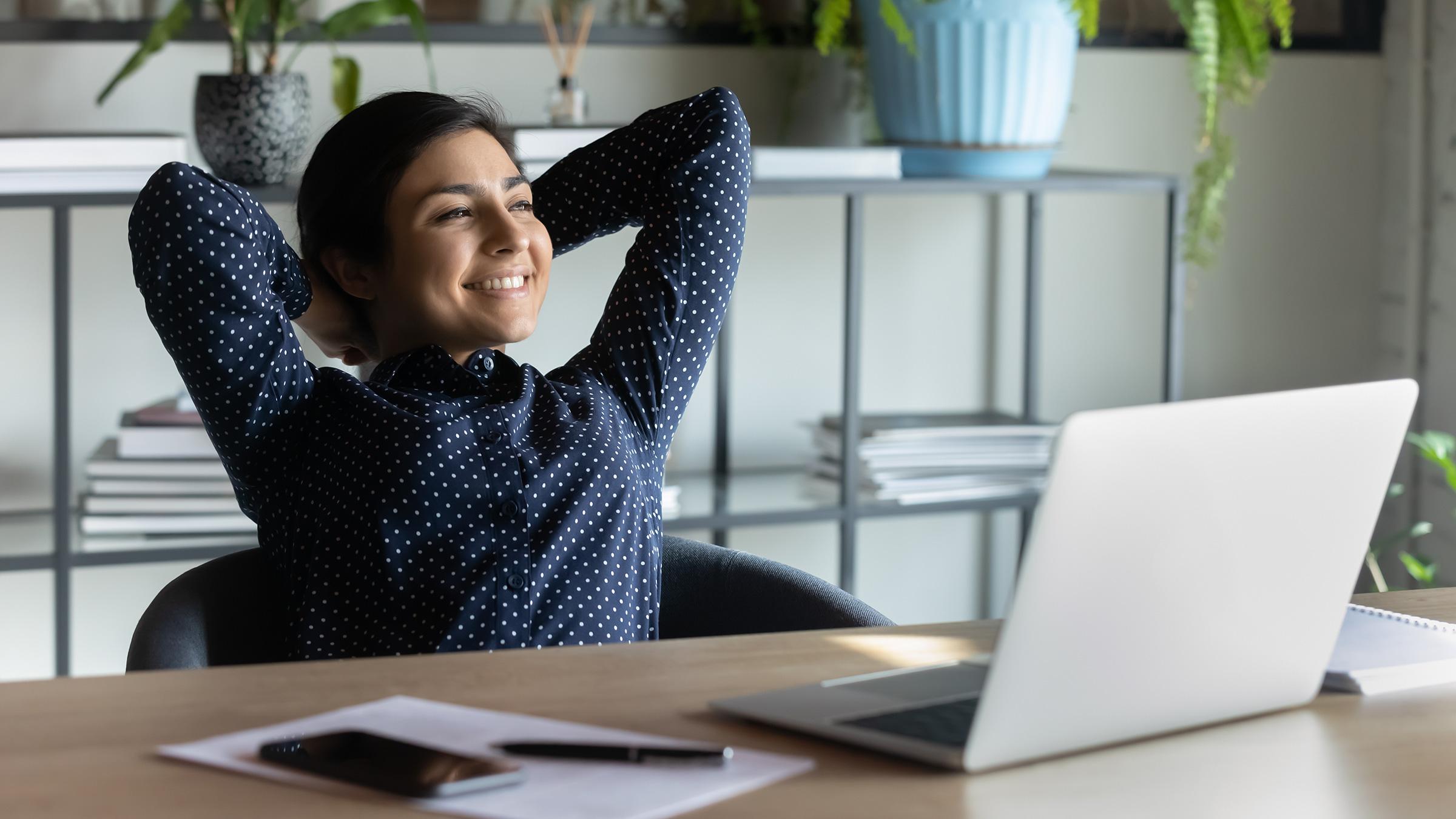 Woman relaxing at computer