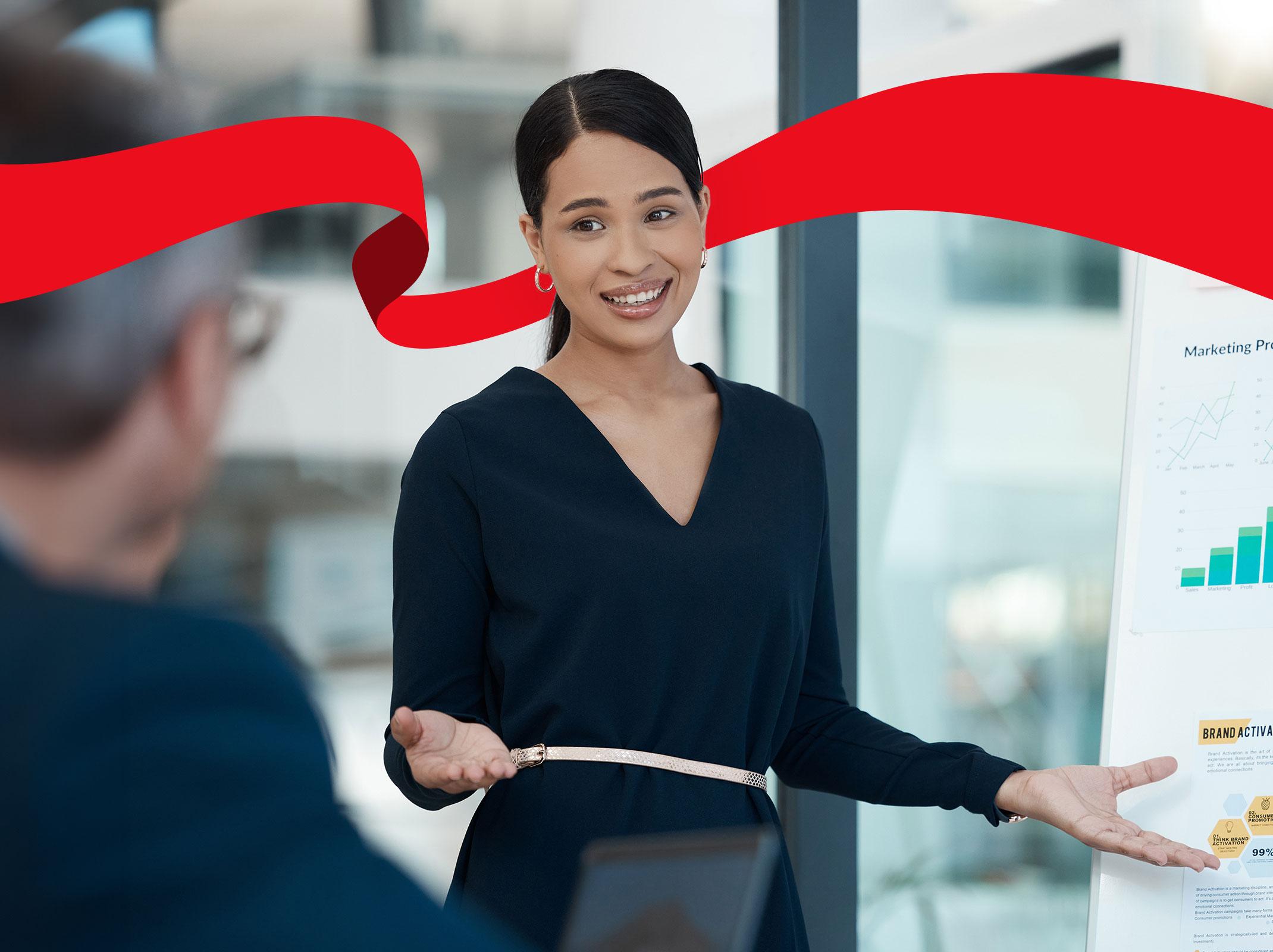 Professional woman giving a presentation to a coworker
