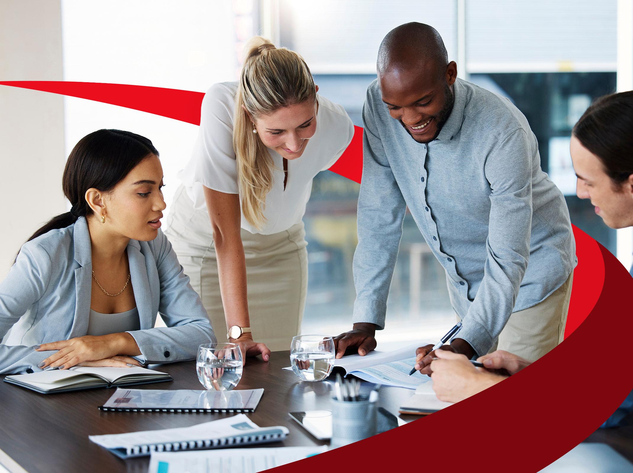 A group of professional coworkers working as a team