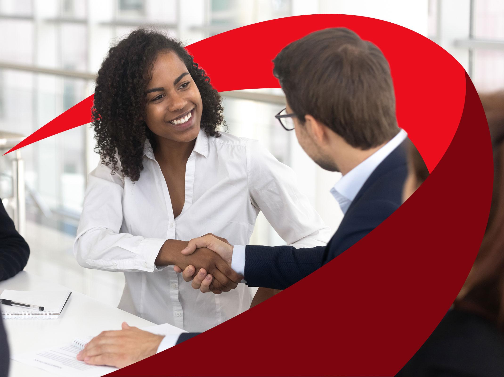 Business professionals communicating effectively and shaking hands